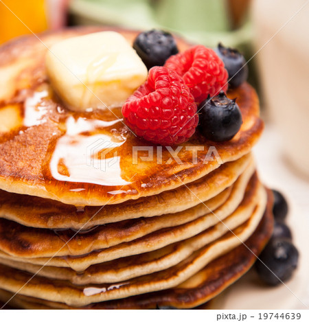 High pile of delicious pancakes High pile of delicious pancakes 19744639