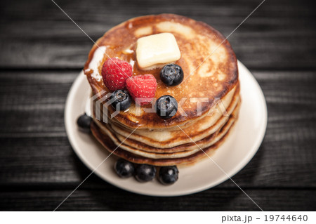 High pile of delicious pancakes High pile of delicious pancakes 19744640