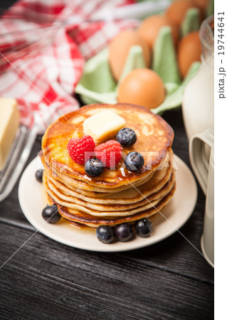 High pile of delicious pancakes High pile of delicious pancakes 19744641