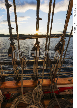 Ropes on sailboat against sunset sky 19761795