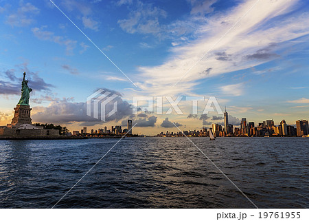 Statue of Liberty and financial district at dusk 19761955