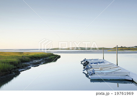 Boats moored in dock 19761969