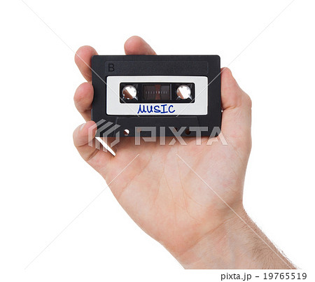 Vintage audio cassette tape, isolated on white  19765519