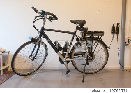 Electric bicycle in a garage Electric bicycle in a garage 19765531