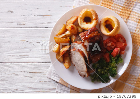 Sunday Roast on the plate close up on the table 19767299