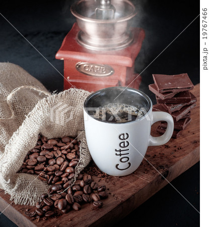 Cup of hot coffee with chocolate. 19767466