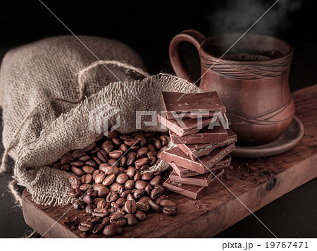 Cup of hot coffee with chocolate. 19767471