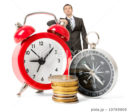 Businessman with big alarm clock Businessman with big alarm clock 19769809