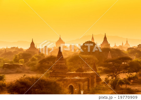 Sunset over pagoda with fog of Bagan in Myanmar. 19770909