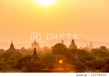 Sunset over pagoda with fog of Bagan in Myanmar. 19770910