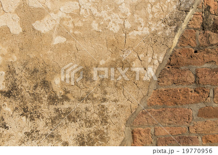 Red grunge brick wall for background or texture. 19770956