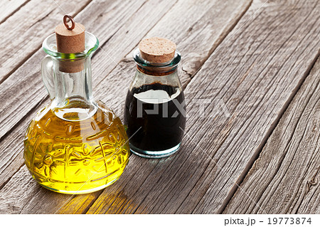 Olive oil and vinegar bottles 19773874