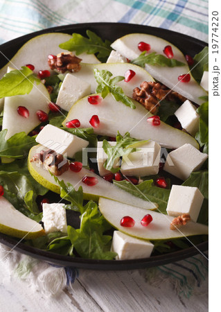 Fresh salad with pears, pomegranates, cheese Fresh salad with pears, pomegranates, cheese 19774220