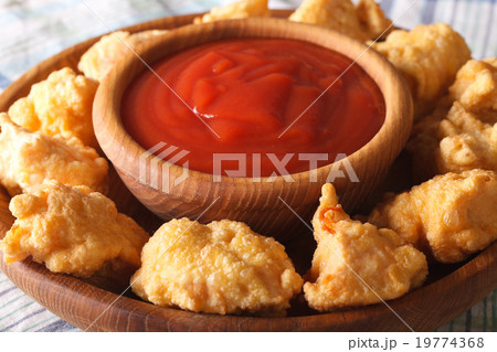 crispy popcorn chicken fillet with sauce macro crispy popcorn chicken fillet with sauce macro 19774368