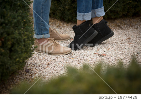 Low view of legs of man and woman 19774429