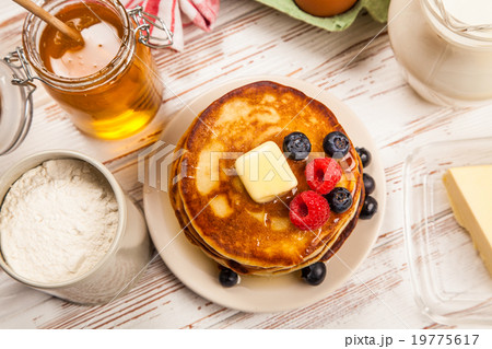 High pile of delicious pancakes 19775617