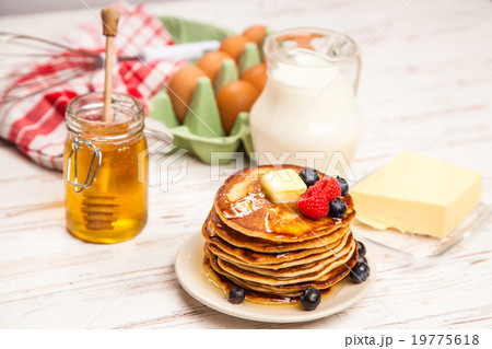 High pile of delicious pancakes 19775618