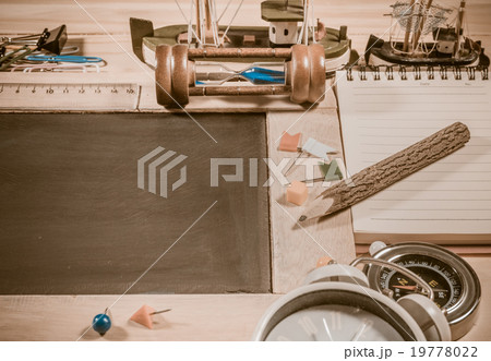 wooden table top view of the chalk board . 19778022
