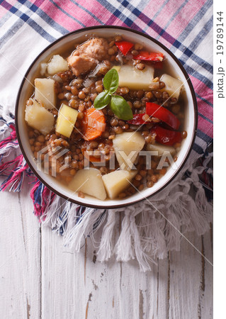 brown lentil soup with vegetables and meat closeup brown lentil soup with vegetables and meat closeup 19789144
