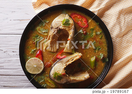 Delicious spicy fish curry with cilantro close up Delicious spicy fish curry with cilantro close up 19789167