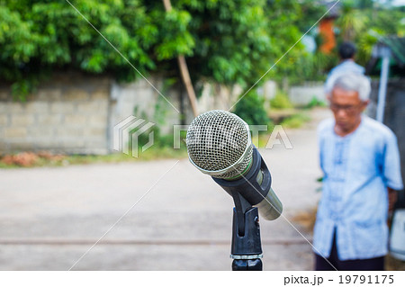 microphone in the background of blurred outdoor  19791175