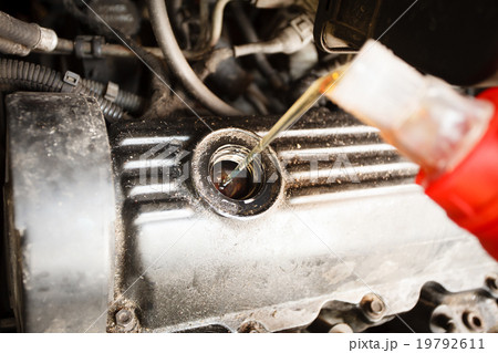 Motor oil, car engine close up 19792611