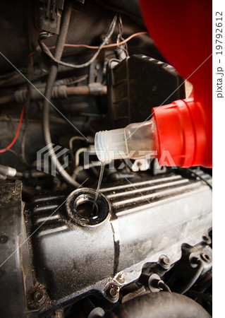 Motor oil, car engine close up 19792612