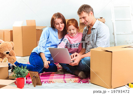 The happy family during repair and relocation The happy family during repair and relocation 19793472
