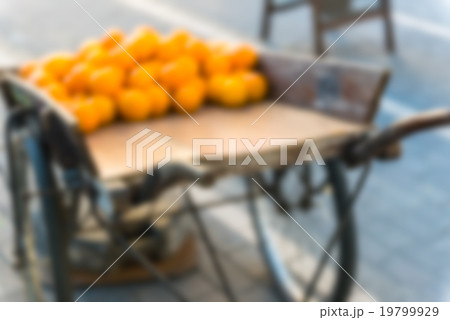 Fresh oranges on vintage wooden cart 19799929