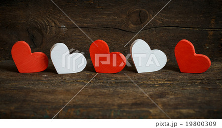 Red and white hearts on old wooden background Red and white hearts on old wooden background 19800309