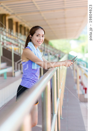 Woman enjoy the music after doing sport 19804623