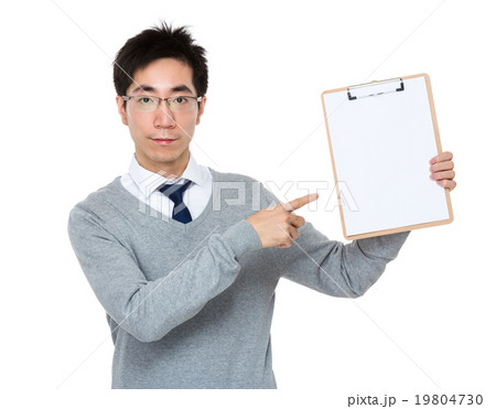 Young businessman finger point to clipboard 19804730