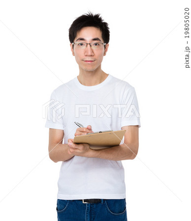 Asian man take note on clipboard 19805020