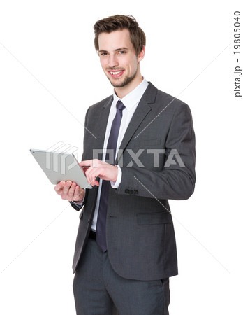 Confident businessman use of tablet pc 19805040
