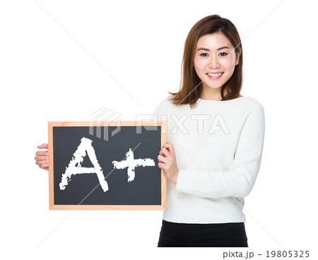 Asian woman with chalkboard and showing mark A plus 19805325