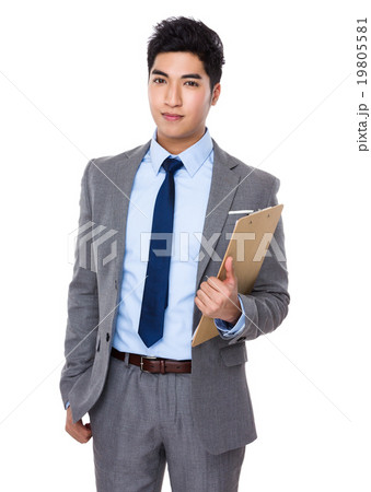 Young businessman hold with clipboard Young businessman hold with clipboard 19805581