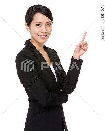 Businesswoman with finger pointing up 19806029