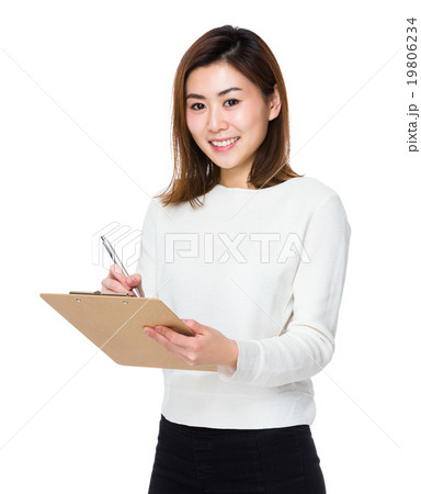 Woman write on clipboard Woman write on clipboard 19806234