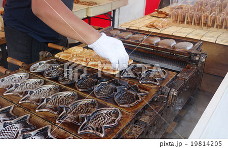 鉄板 屋台の鯛焼きの写真素材 鉄板 屋台の鯛焼きの写真素材