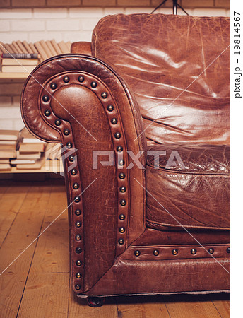 Closeup texture of vintage brown leather armchair Closeup texture of vintage brown leather armchair 19814567