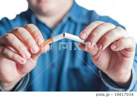 Quit smoking, human hands breaking the cigarette Quit smoking, human hands breaking the cigarette 19817038
