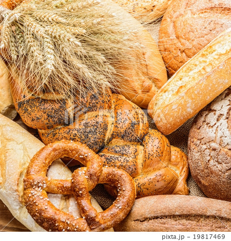 fresh bread  and wheat on the wooden 19817469
