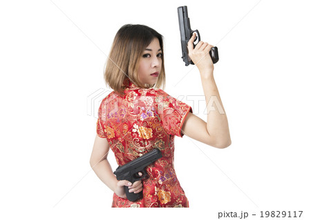 Beautiful woman with gun 19829117
