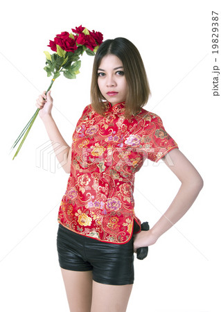 Beautiful woman with gun and flower 19829387