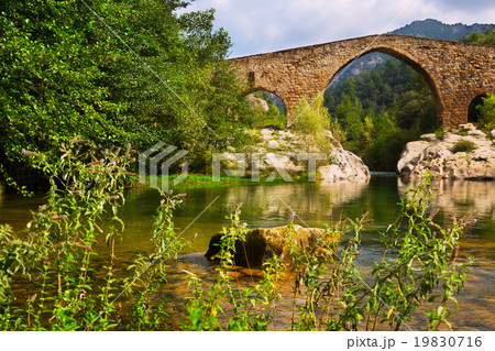 Medieval stone bridge over Llobregat river in Pyrenees Medieval stone bridge over Llobregat river in Pyrenees 19830716