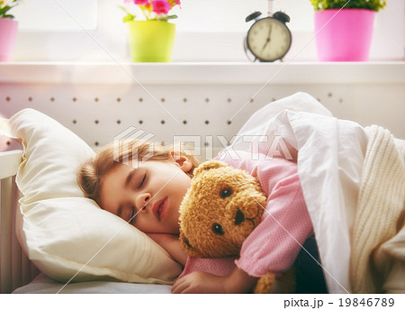 girl sleeping in the bed 19846789