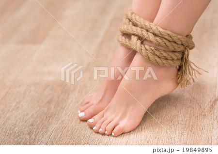 Slip legs bound with rope 19849895