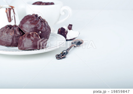 Chocolate  zephyr and cup of coffee  19859847