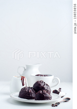 Chocolate  zephyr and cup of coffee  19859856