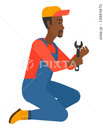 Repairman holding spanner. 19864870